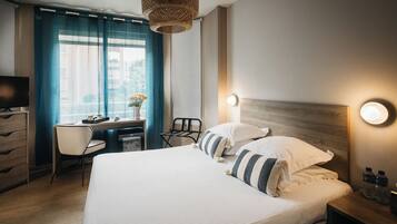 Standard Double Room | Minibar, in-room safe, desk, blackout curtains