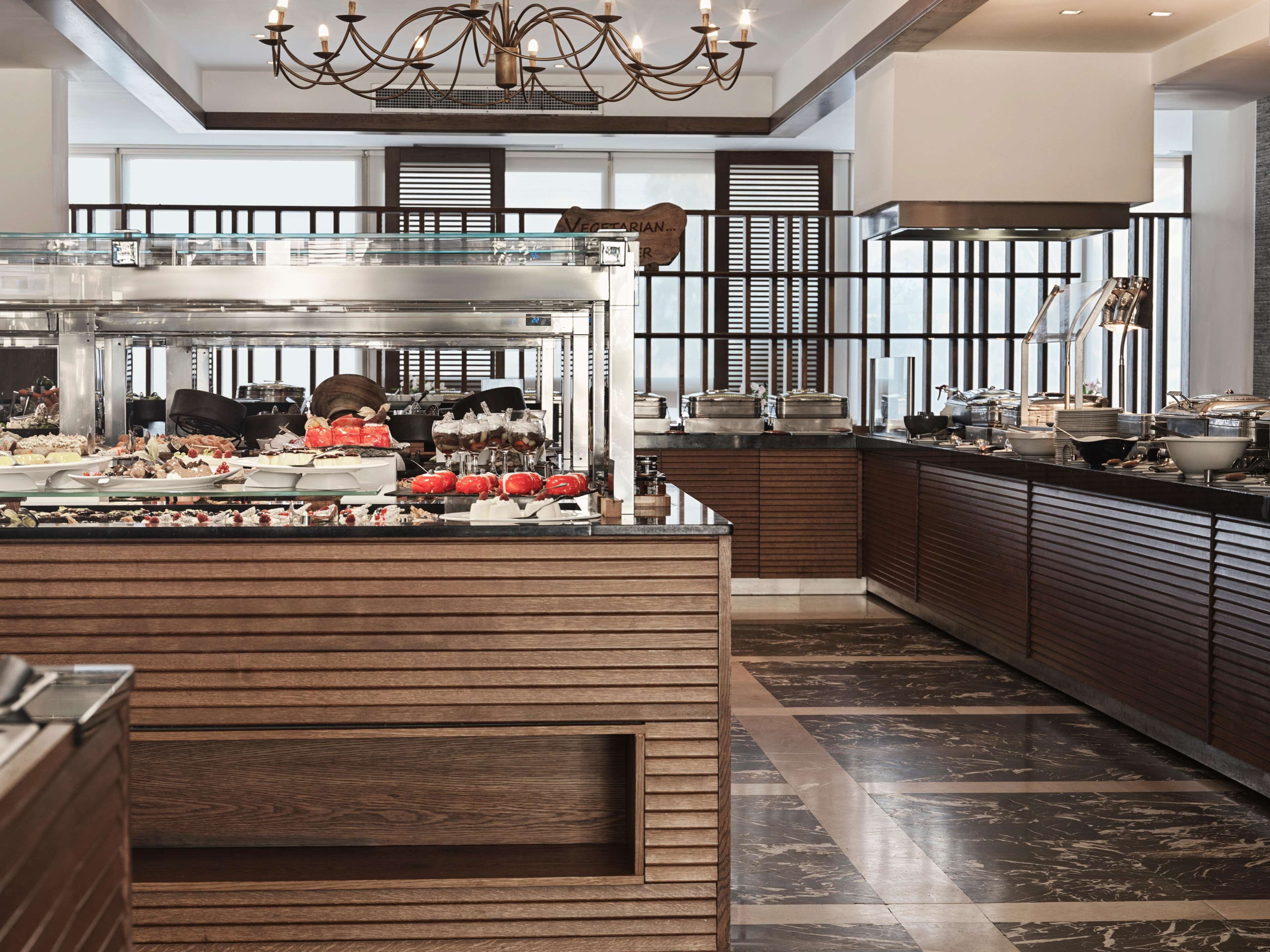 4 restaurants, breakfast, lunch, dinner served; international cuisine