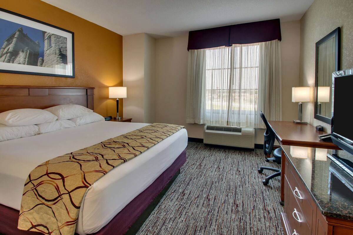 desk, blackout curtains, iron/ironing board, free cots/infant beds