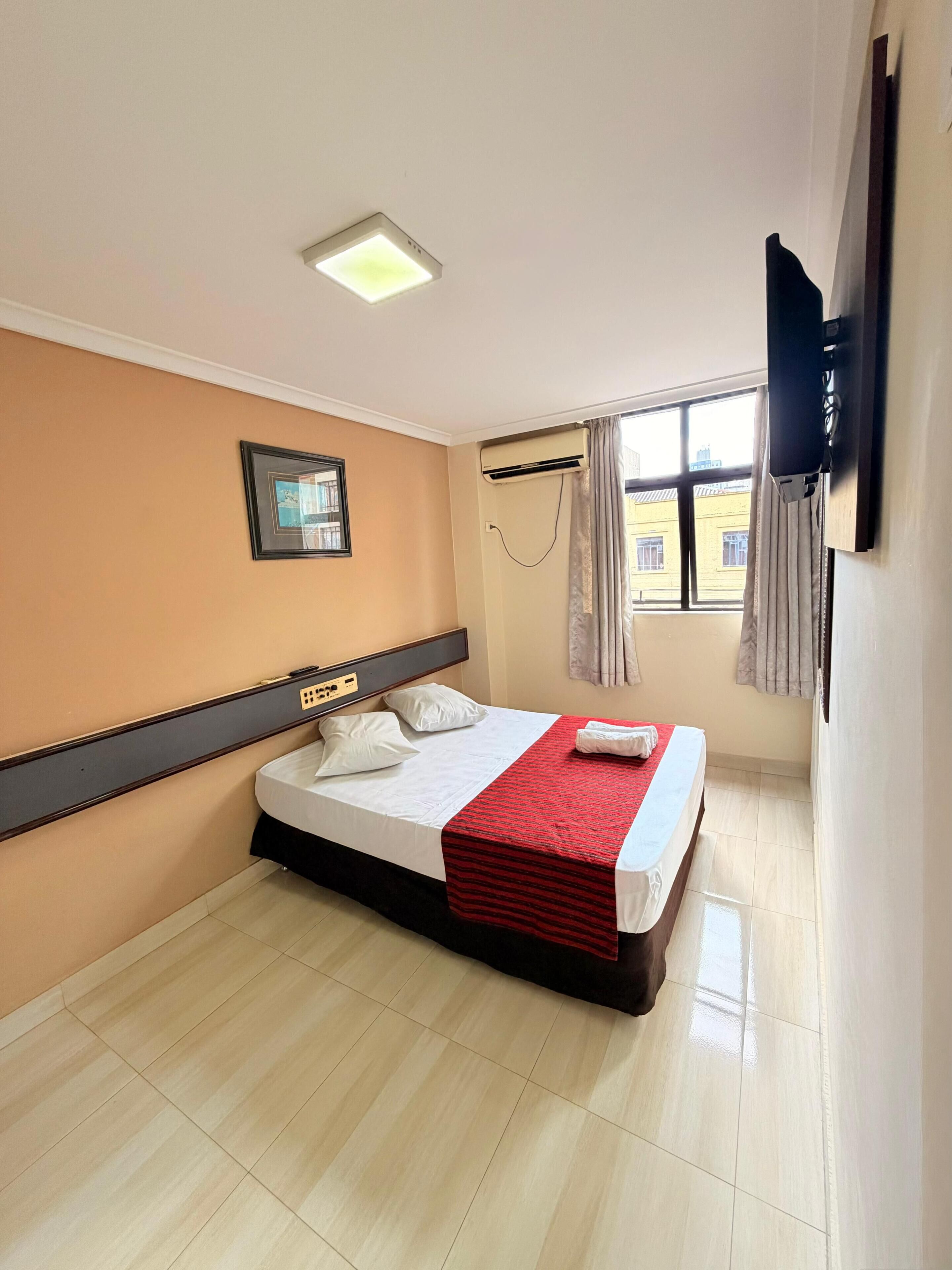 Double or Twin Room | Minibar, desk, free cribs/infant beds, rollaway beds