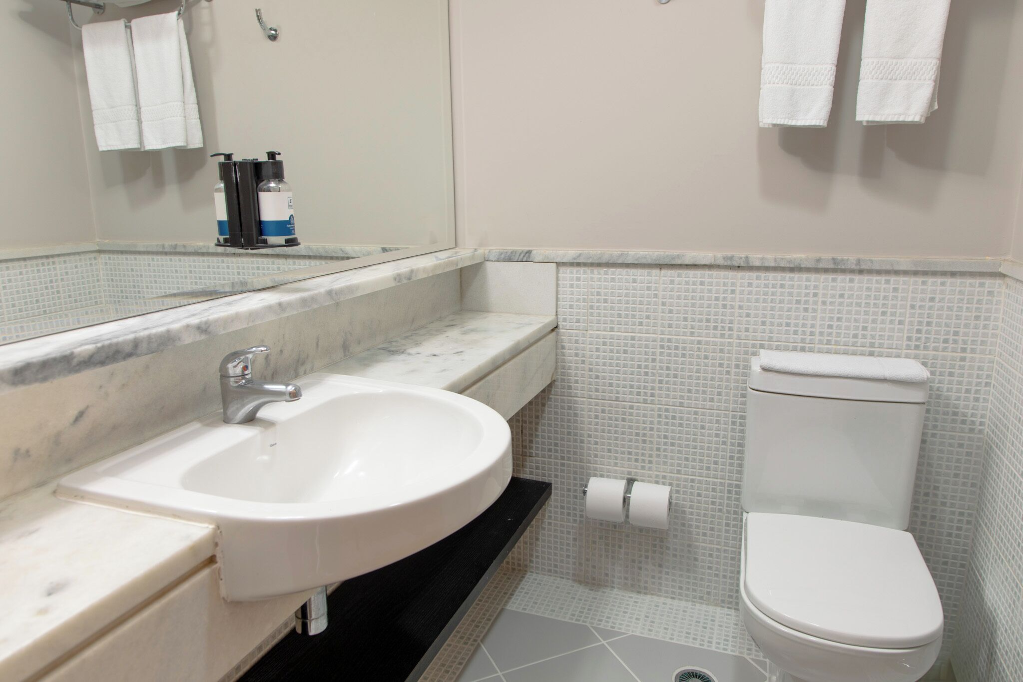 superior twin room | bathroom | shower, hair dryer, towels