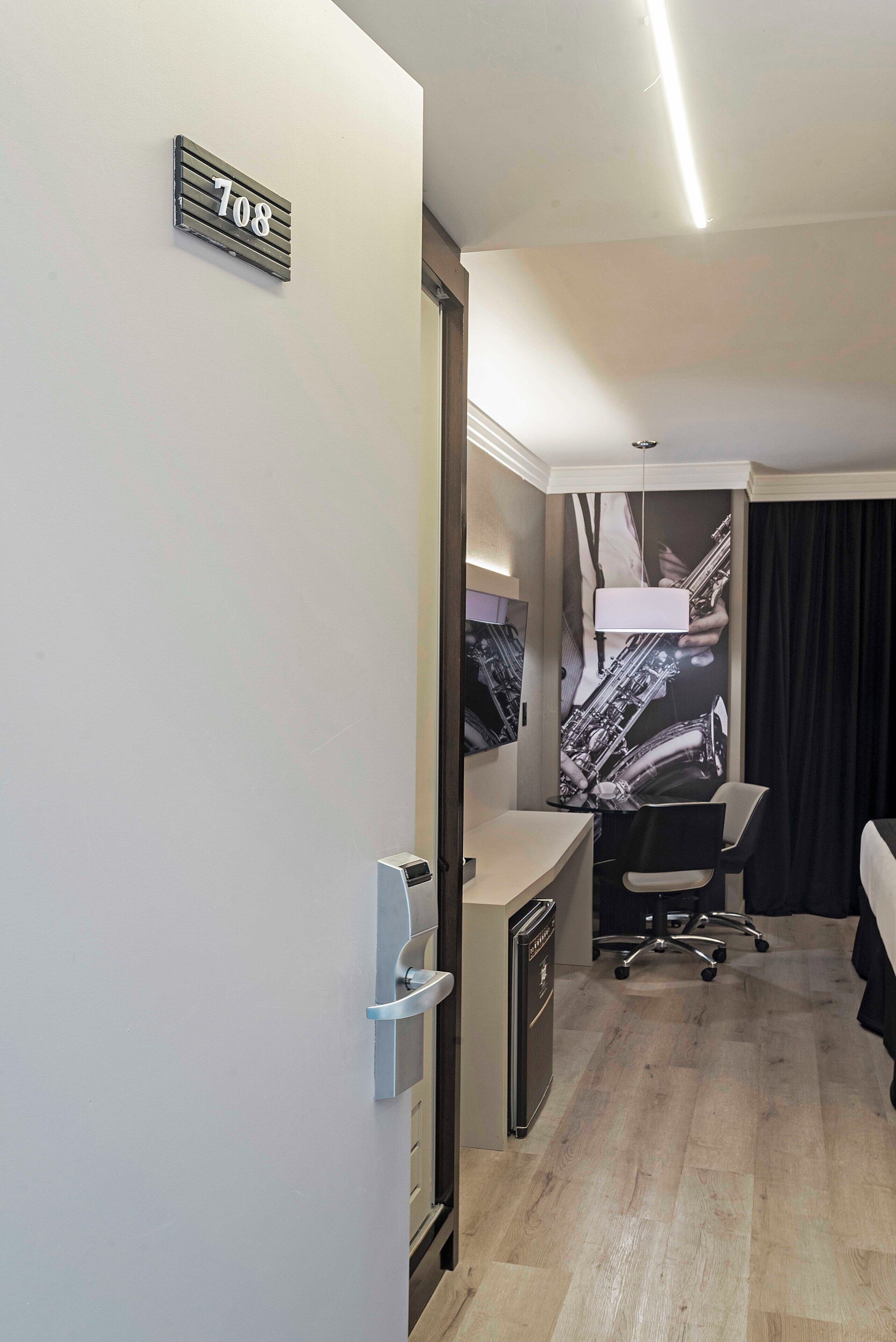 premium room | 1 bedroom, minibar, in-room safe, laptop workspace