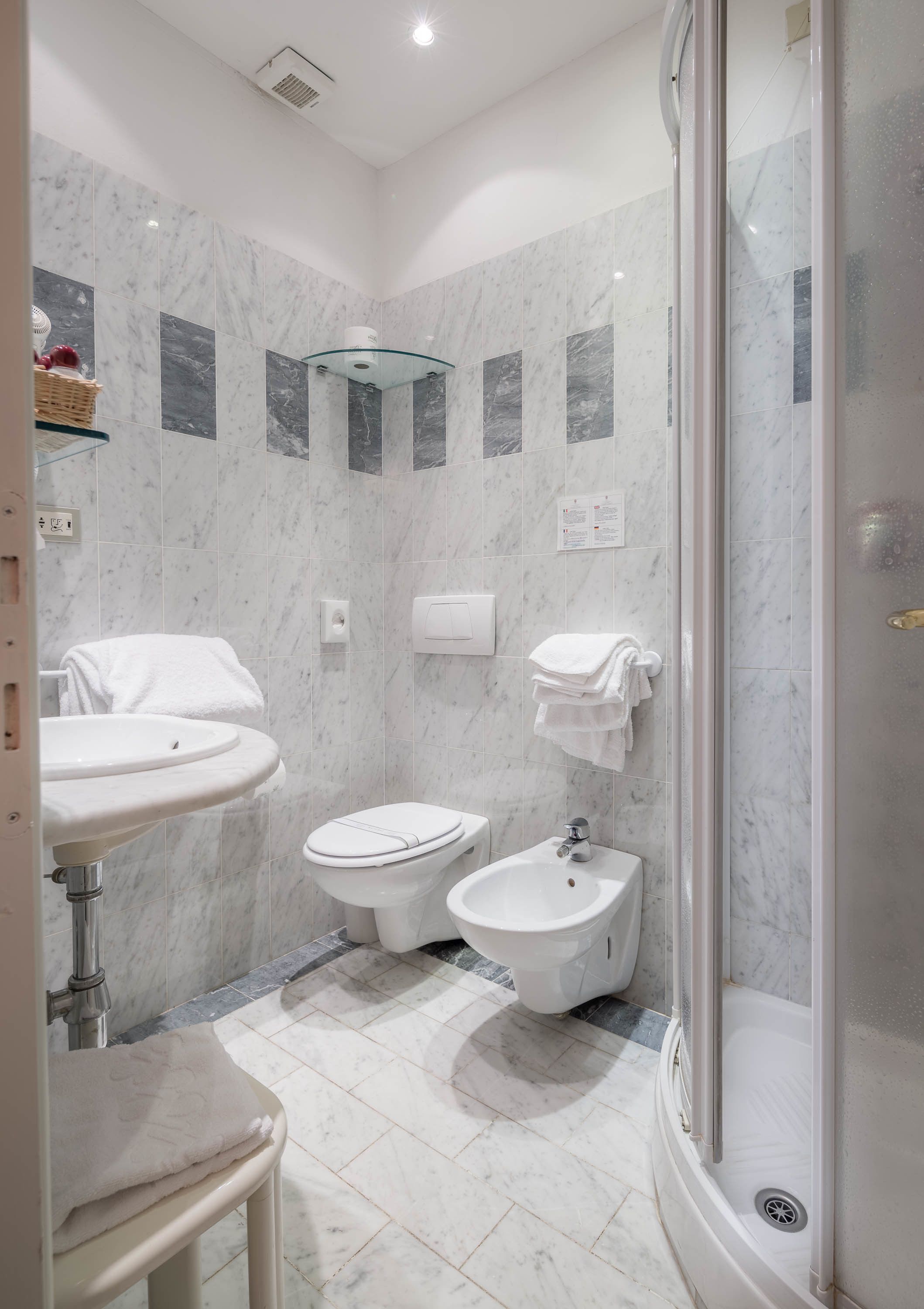 shower, free toiletries, hair dryer, slippers