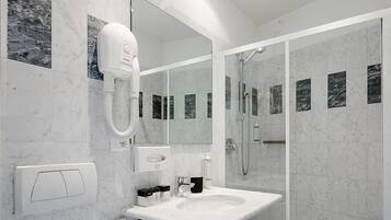 Shower, free toiletries, hair dryer, slippers