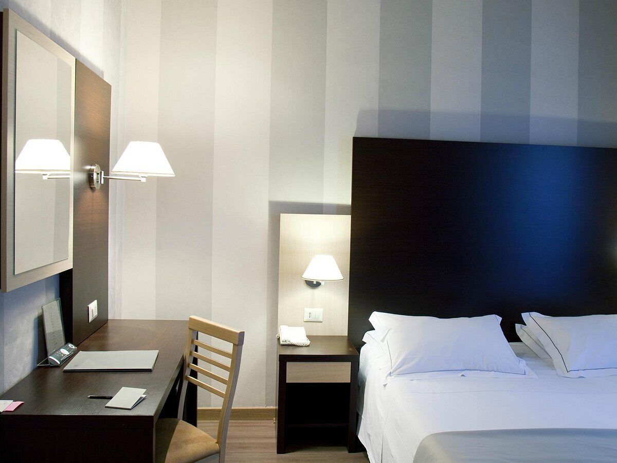 Free minibar items, in-room safe, desk, laptop workspace