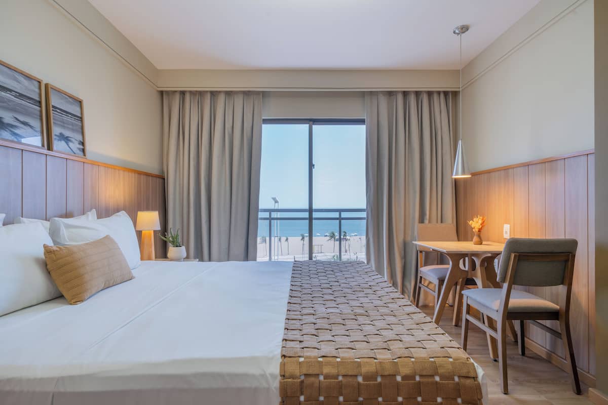 Superior Double Room, Sea Facing | Minibar, in-room safe, desk, laptop workspace