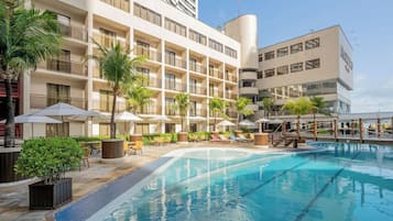 Outdoor pool, open 9:00 AM to 9:00 PM, pool loungers