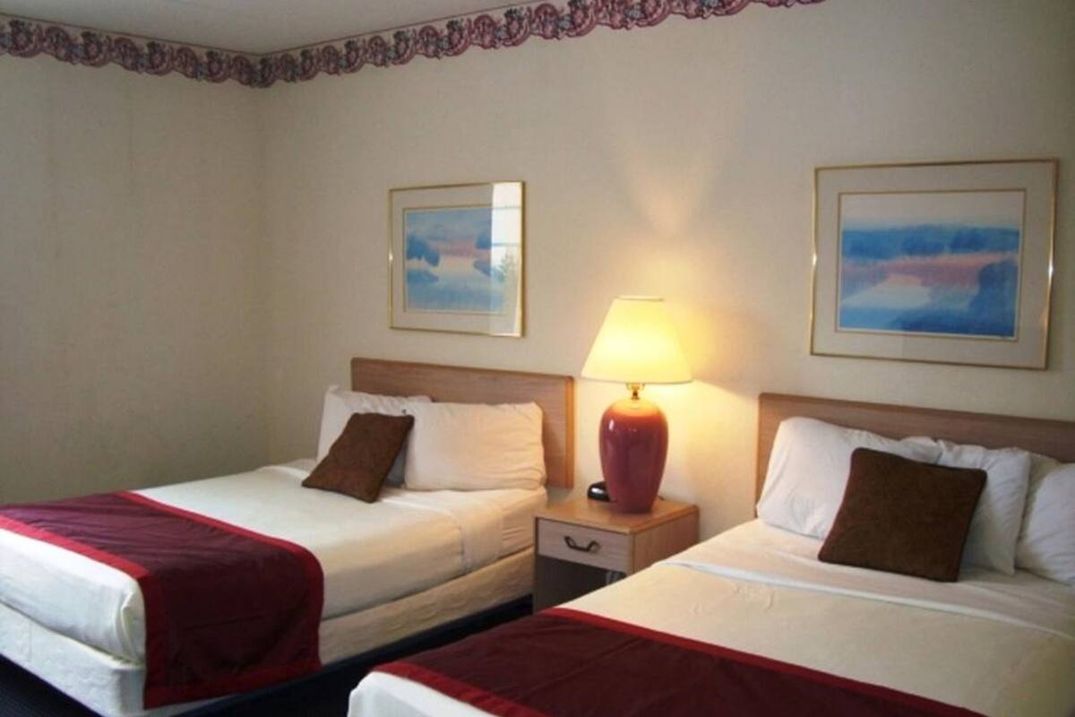 Pillowtop beds, desk, iron/ironing board, WiFi (free)