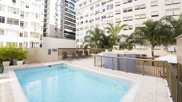 Outdoor pool, pool umbrellas, pool loungers