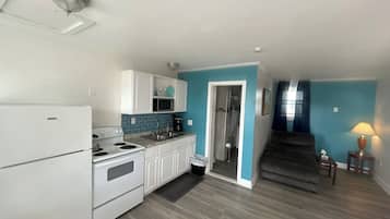 Estudi en suite, 1 llit de matrimoni | Cuina privada | Frigorífic, microones, forn i placa de cuina