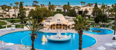 Indoor pool, 4 outdoor pools, free pool cabanas, pool umbrellas