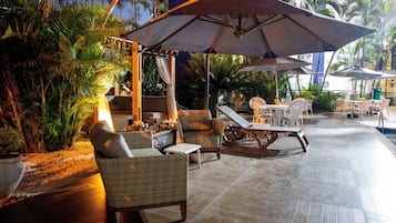 Outdoor pool, open 10:30 AM to 9:00 PM, free cabanas, pool umbrellas