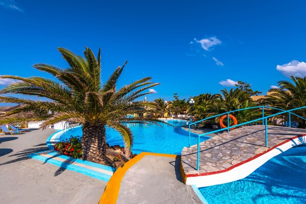 Outdoor pool, pool umbrellas, pool loungers