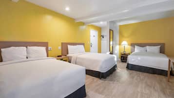 Desk, blackout curtains, iron/ironing board, rollaway beds