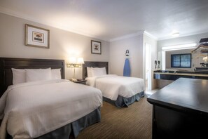 Desk, blackout drapes, iron/ironing board, rollaway beds