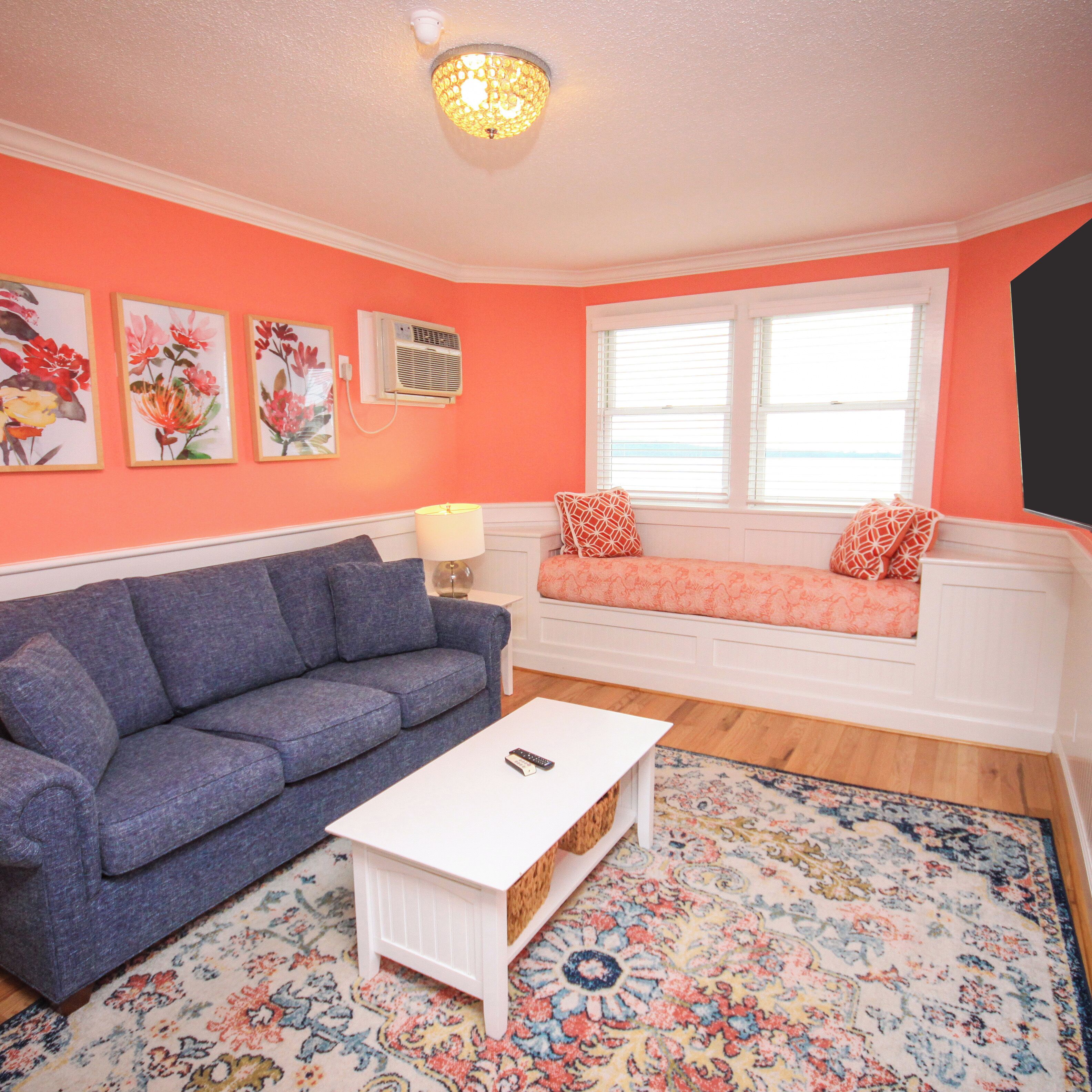 premium suite, 1 bedroom, harbour view | living area | tv