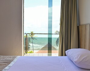 Apartamento Vista Mar | Minibar, coffres-forts dans les chambres, lits pliants/supplémentaires