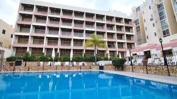 Outdoor pool, pool umbrellas, pool loungers