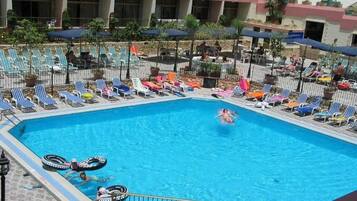 Outdoor pool, pool umbrellas, pool loungers