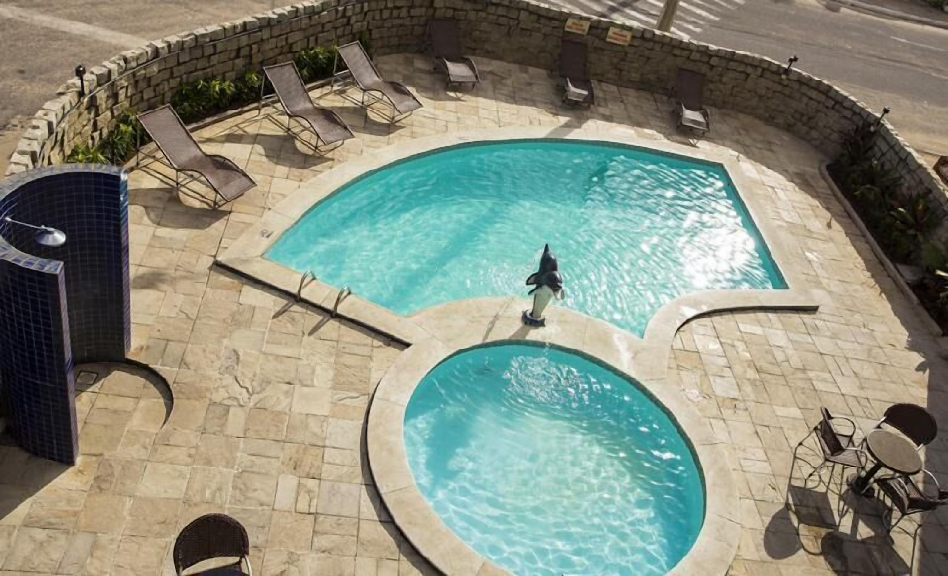 Outdoor pool, open 8 AM to 9 PM, sun loungers