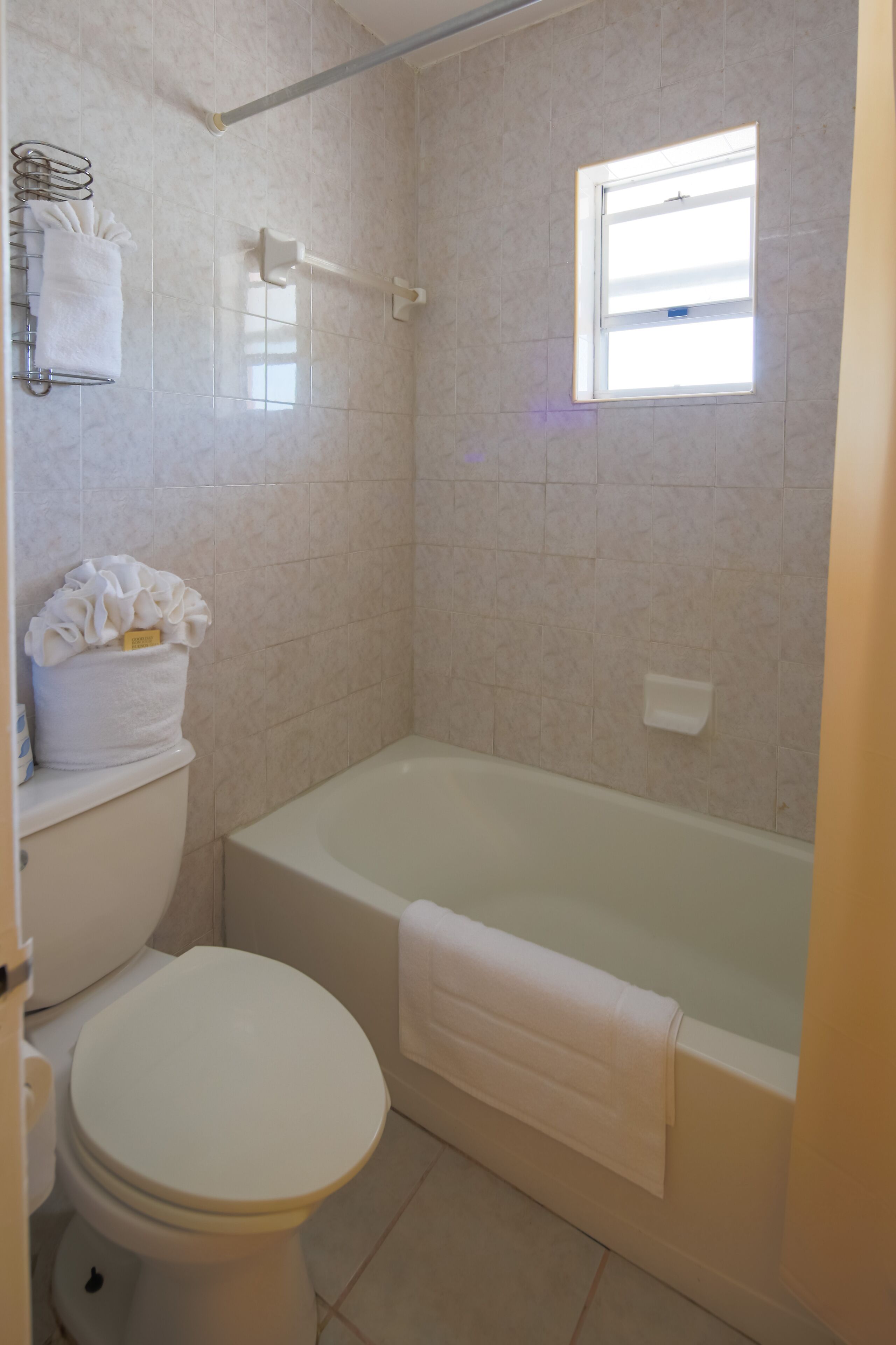junior studio suite | bathroom | combined shower/bathtub, hair dryer, towels
