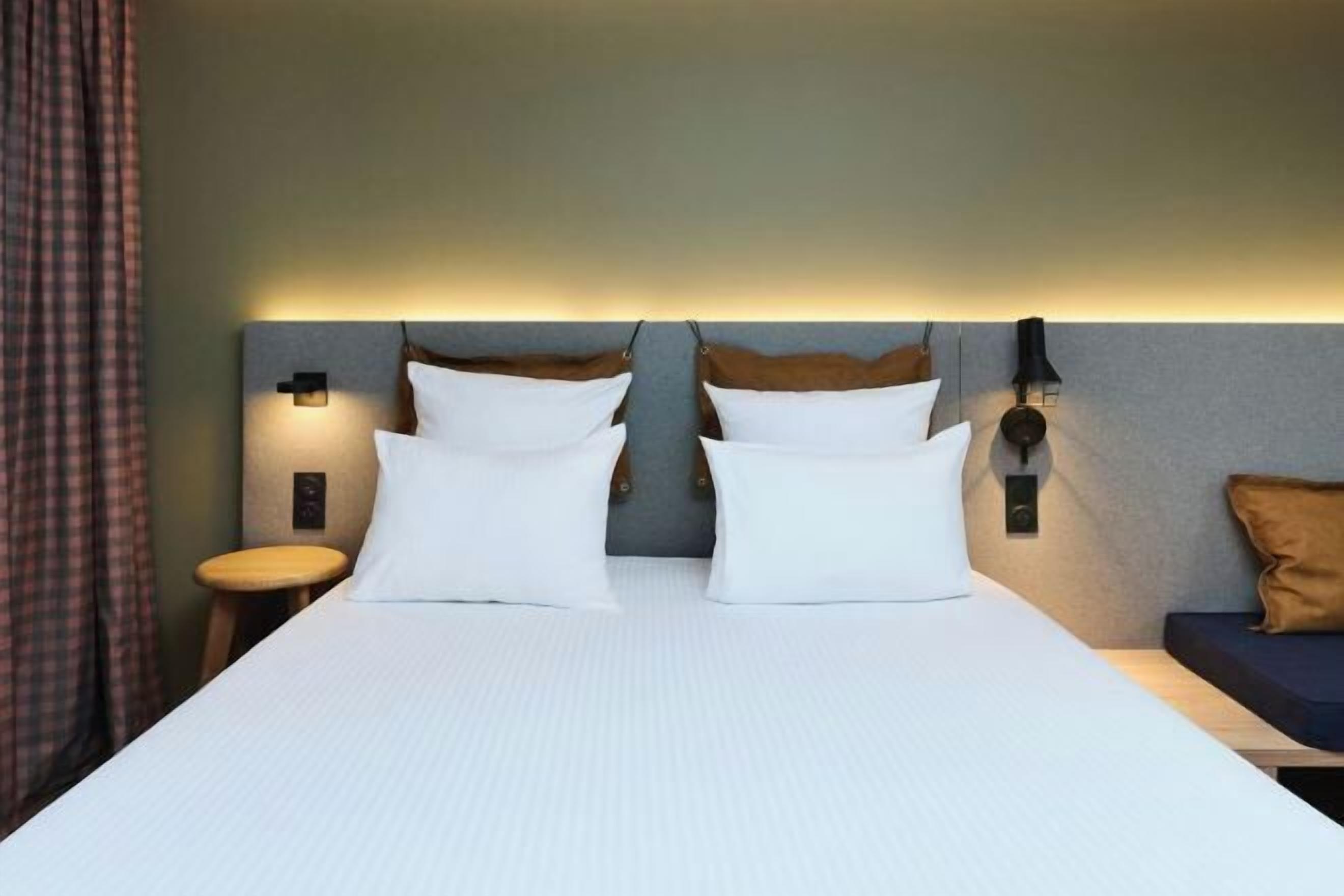 Premium bedding, laptop workspace, free WiFi, bed sheets