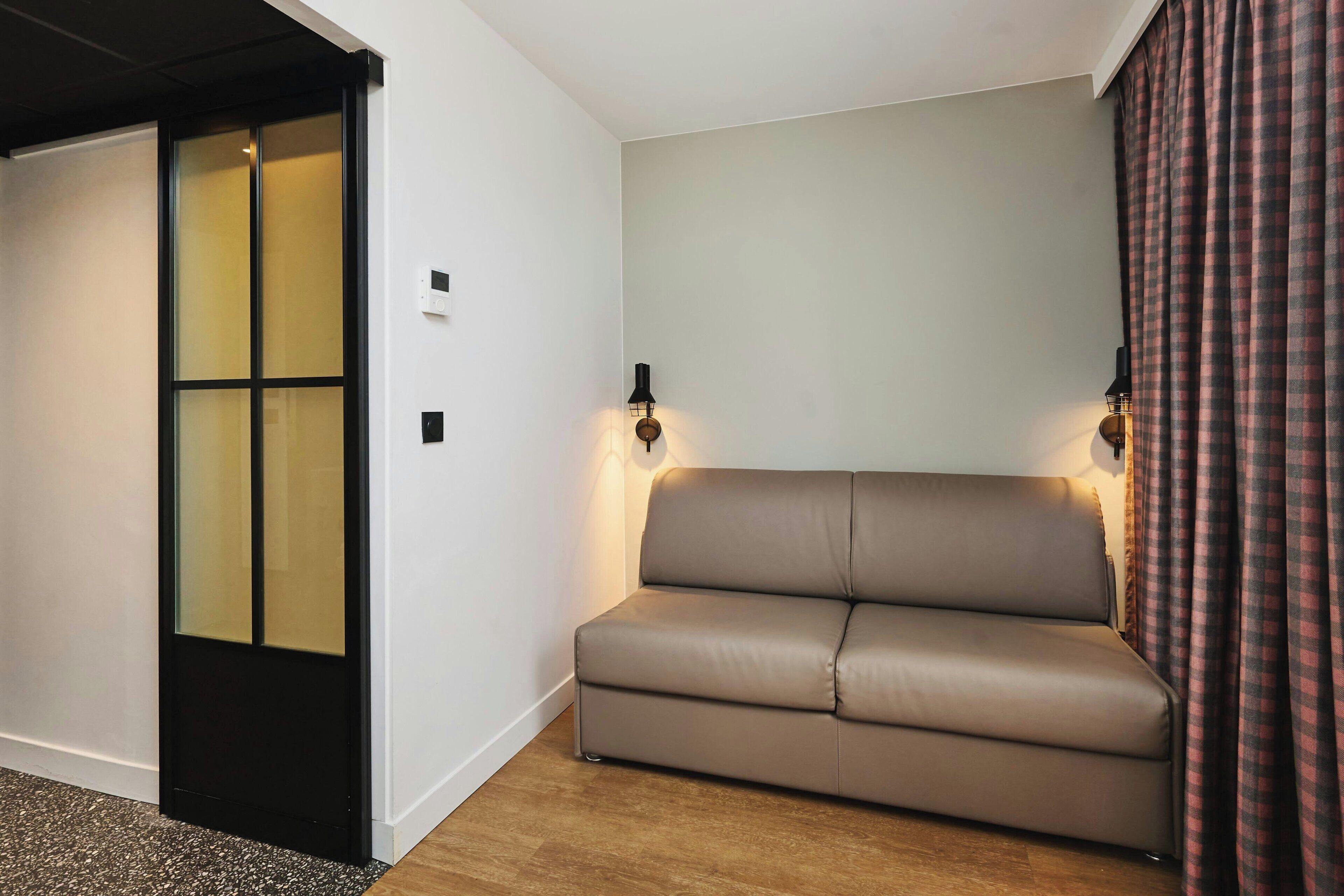 family room, 1 queen bed, balcony | 1 bedroom, premium bedding, laptop workspace, free wifi