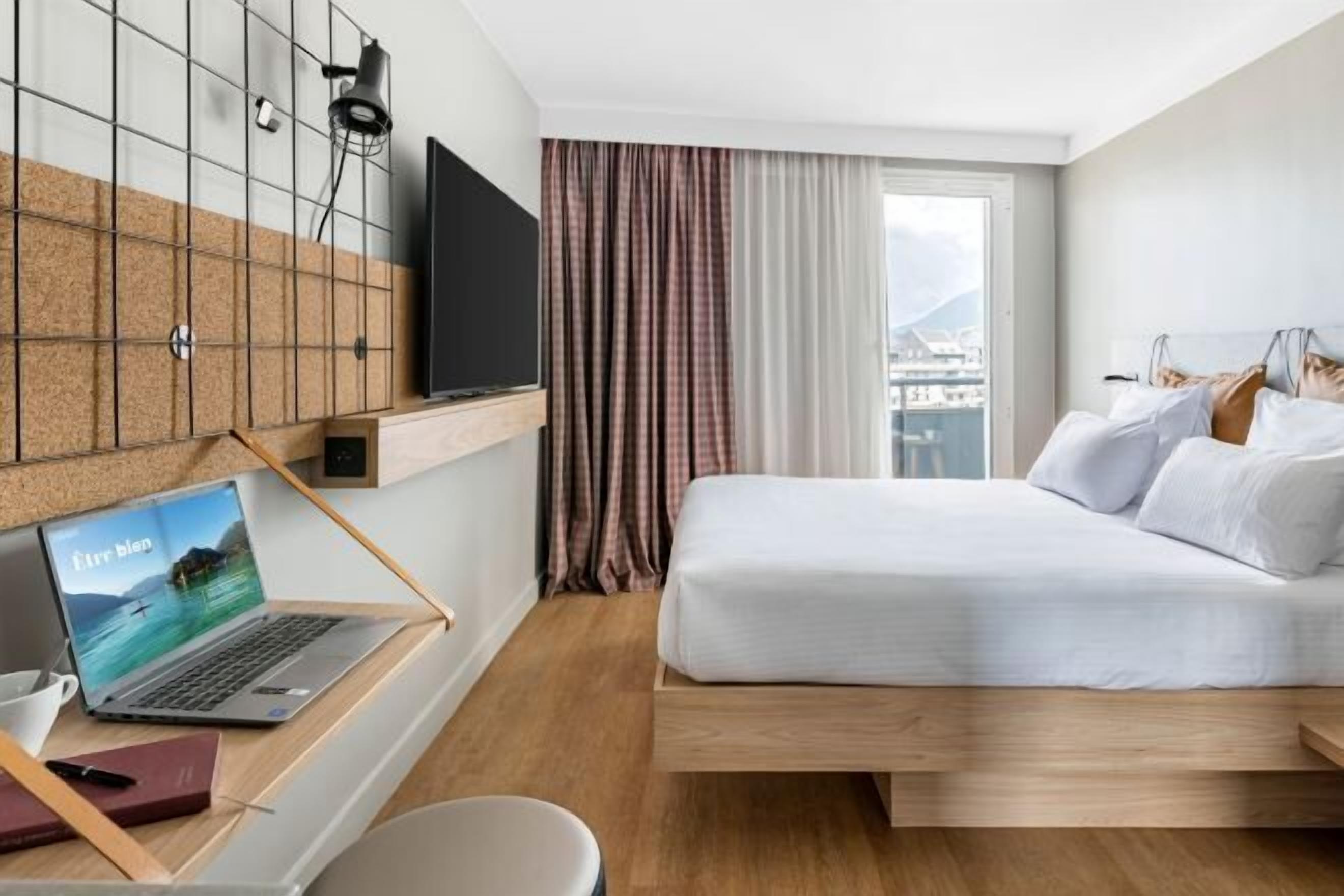 Premium bedding, laptop workspace, free WiFi, bed sheets