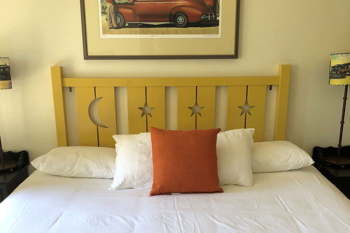 patio queen guest room ada accessible | desk, iron/ironing board, free wifi, bed sheets