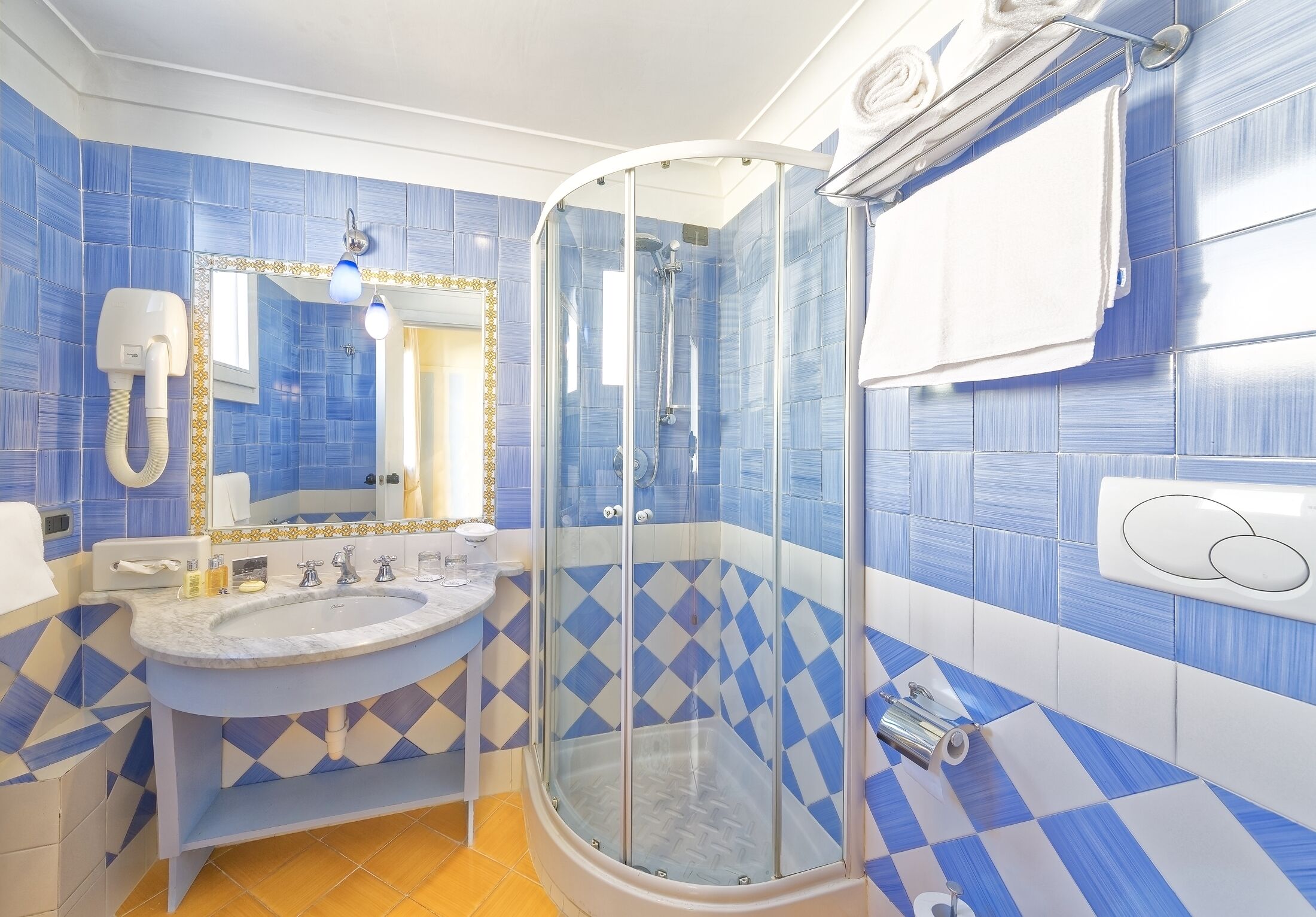 free toiletries, hair dryer, bidet, towels