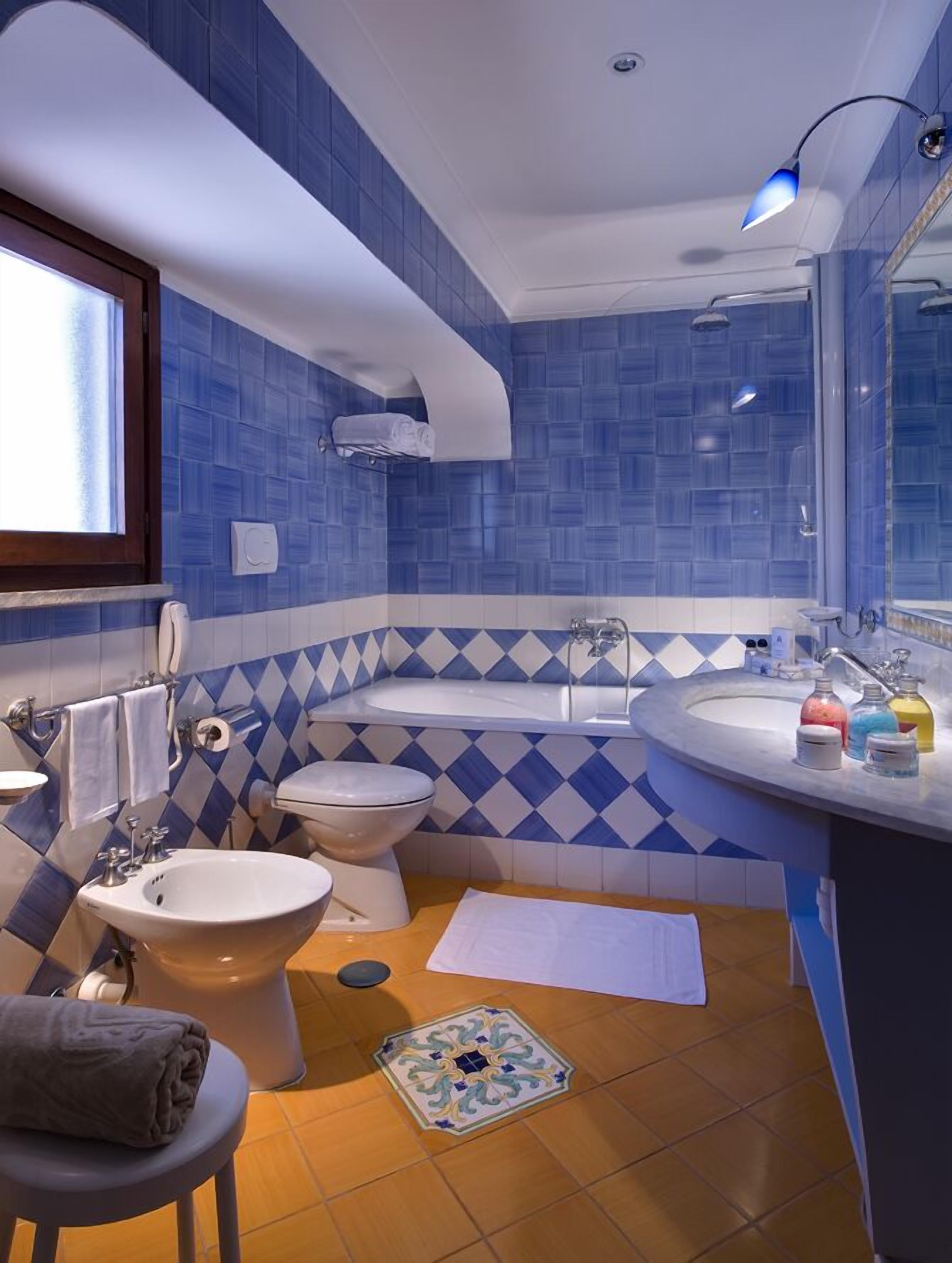 free toiletries, hair dryer, bidet, towels