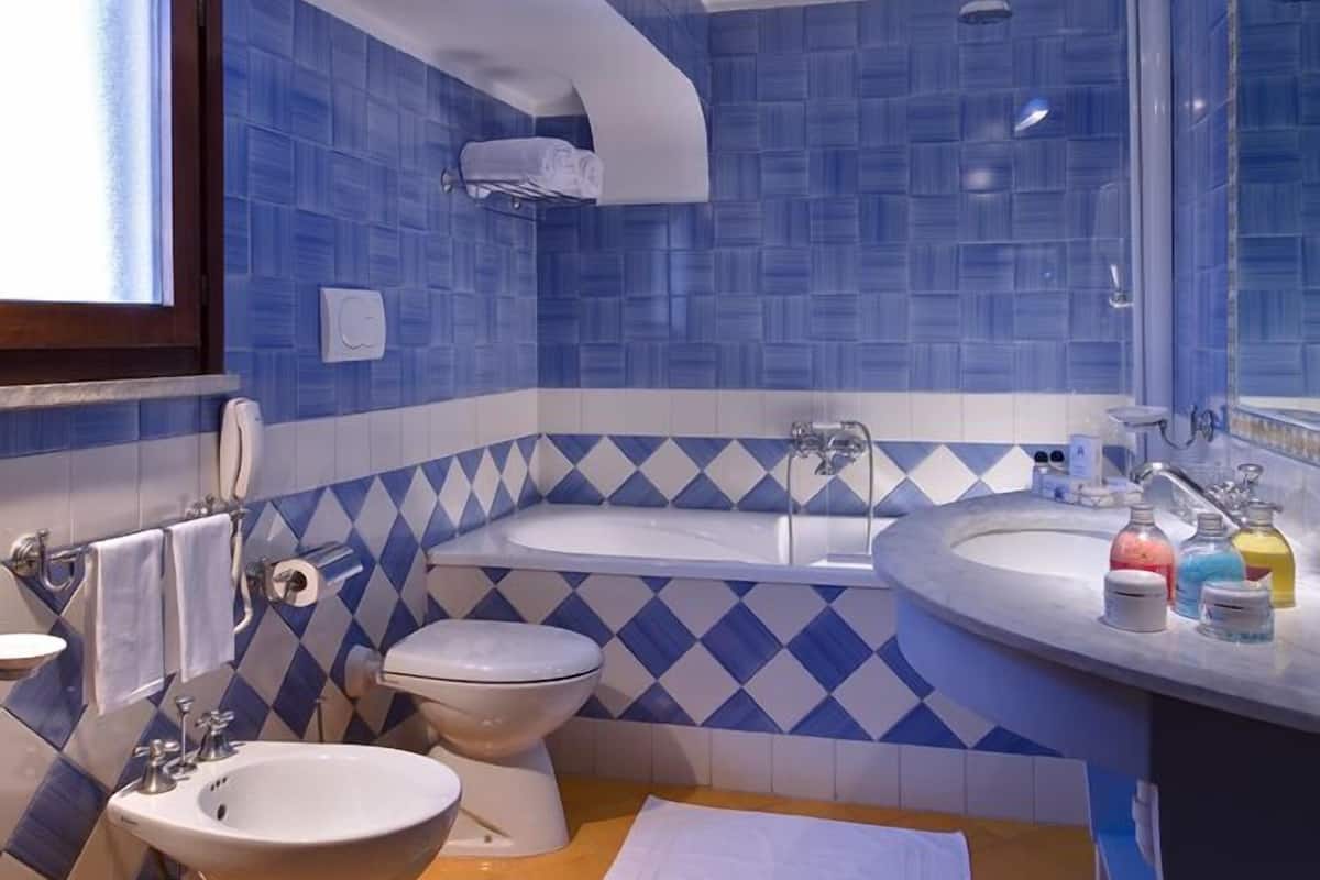 free toiletries, hair dryer, bidet, towels