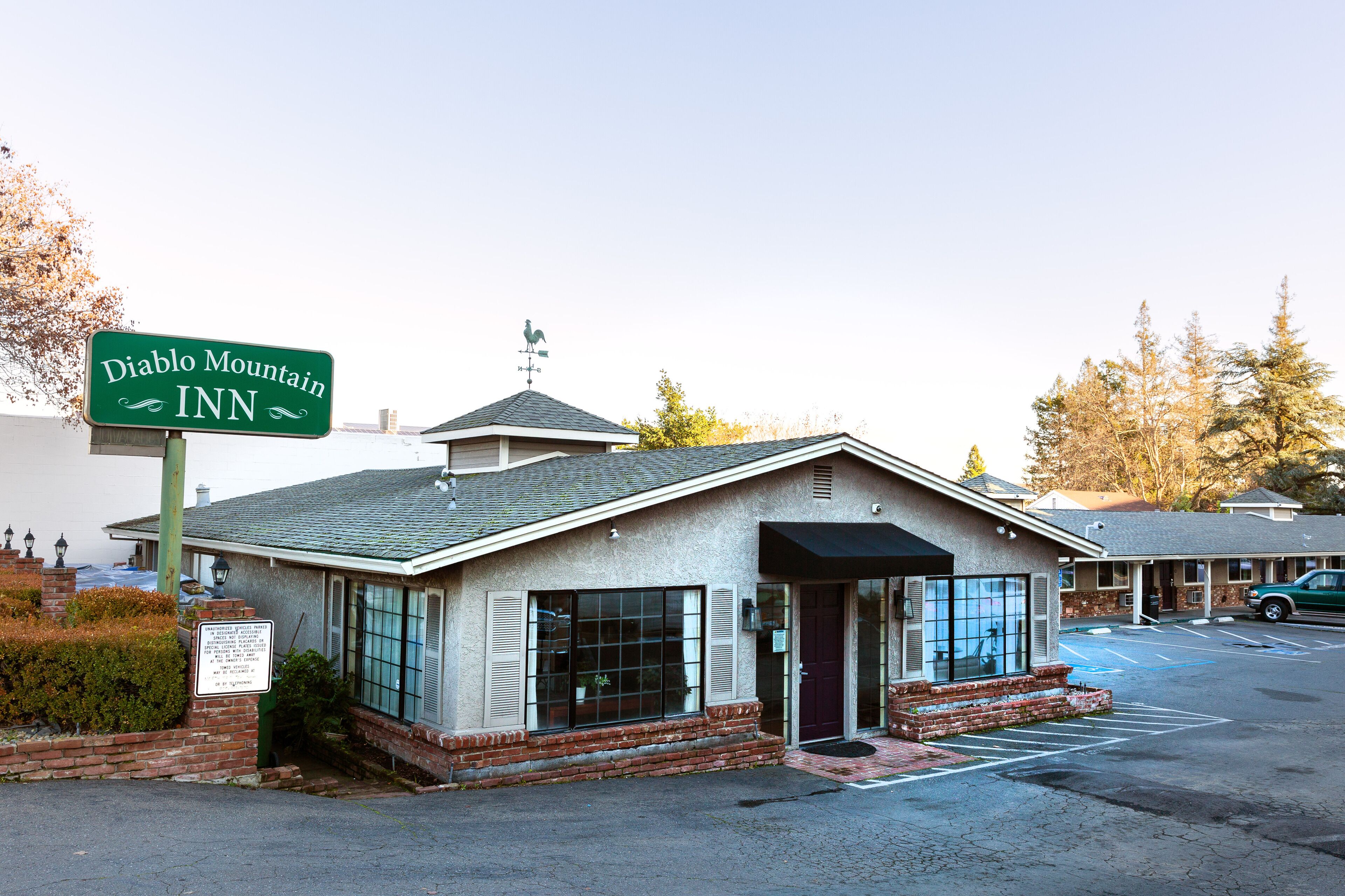 A small, single-story building with a sign reading "Diablo Mountain INN."