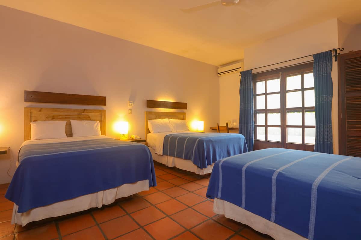 standard triple room | in-room safe, desk, iron/ironing board, bed sheets