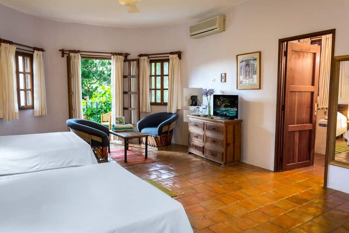 junior suite, 2 double beds | in-room safe, desk, iron/ironing board, bed sheets