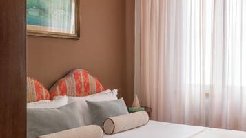 Economy Double or Twin Room | Down comforters, minibar, blackout drapes, free WiFi