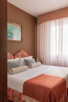 Economy Double or Twin Room | Down comforters, minibar, blackout drapes, free WiFi