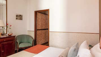 Economy Double or Twin Room | Down comforters, minibar, blackout drapes, free WiFi