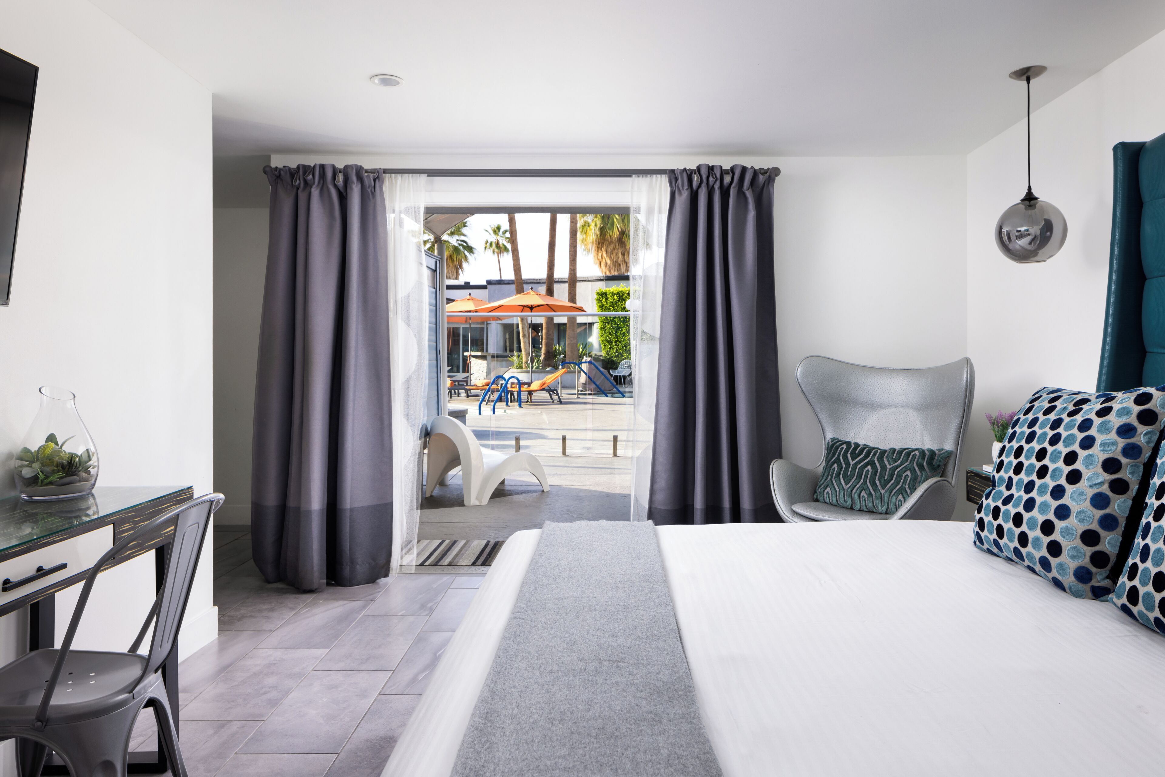 deluxe room, 1 king bed, pool view | pillow-top beds, in-room safe, desk, blackout curtains