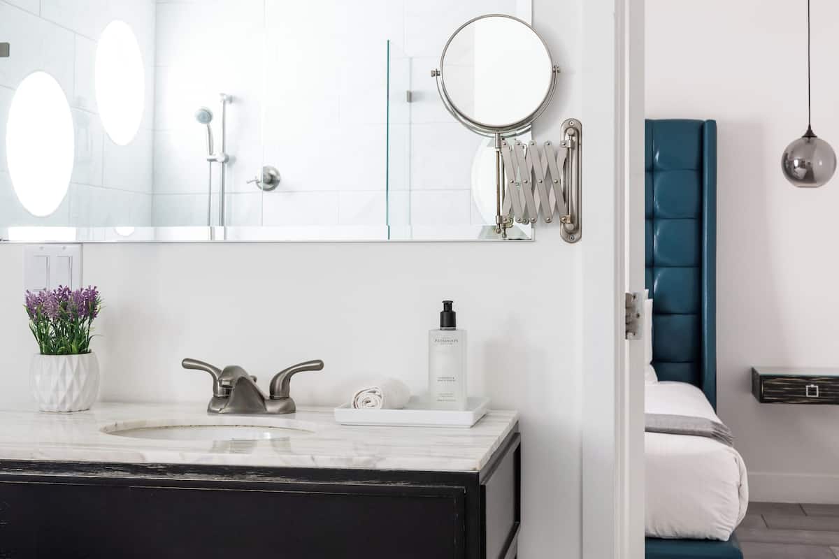 suite, 1 king bed with sofa bed, pool view | bathroom | shower, rainfall showerhead, free toiletries, hair dryer