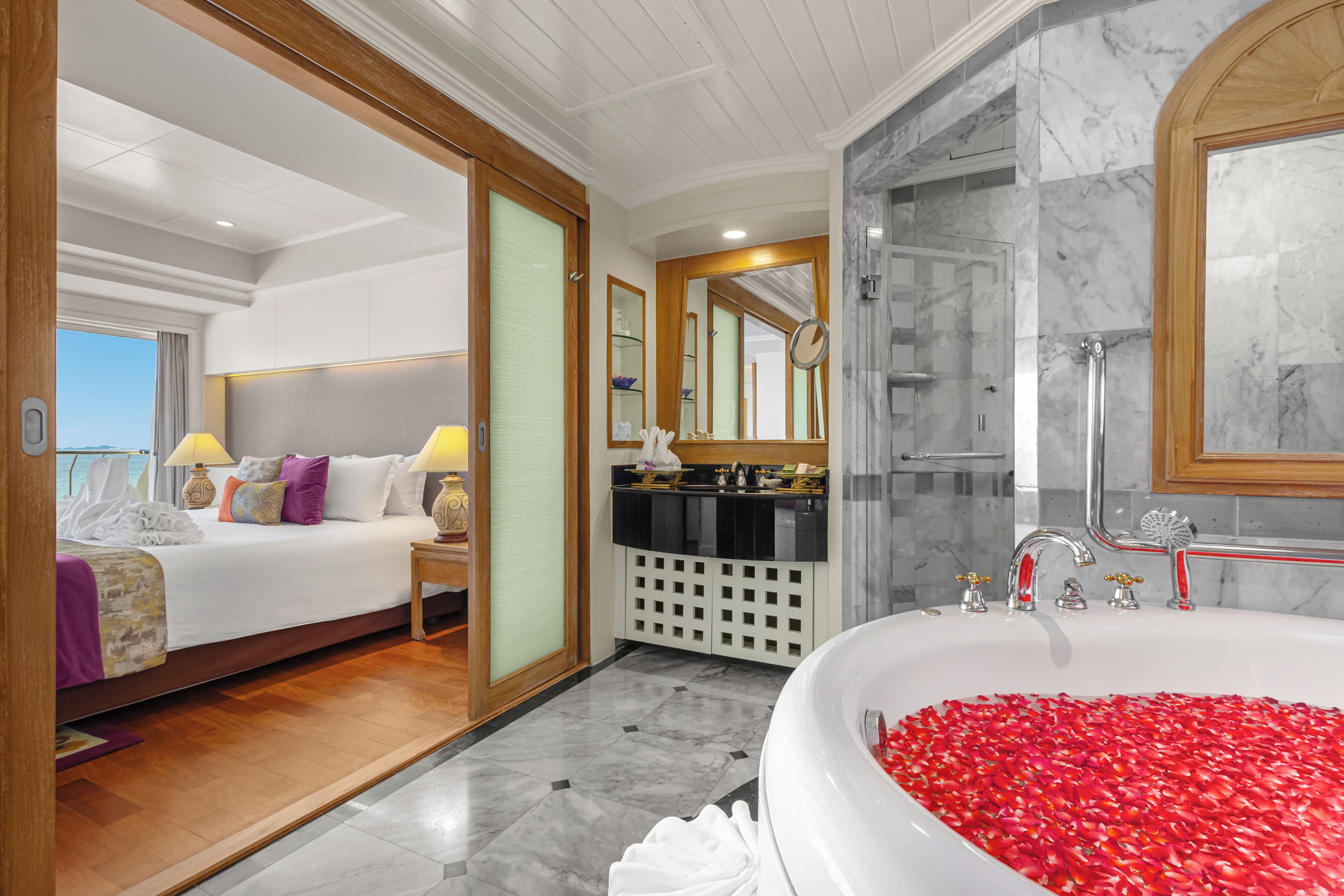 one bedroom royal wing suite | bathroom | separate bathtub and shower, jetted bath, rainfall showerhead