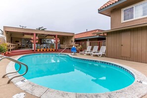 Outdoor pool, open 8:00 AM to 10 PM, sun loungers
