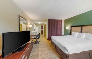 A hotel room with a bed, a TV, a desk, and a bathroom visible in the background. - Extended Stay America Suites Los Angeles Simi Valley (Simi Valley)