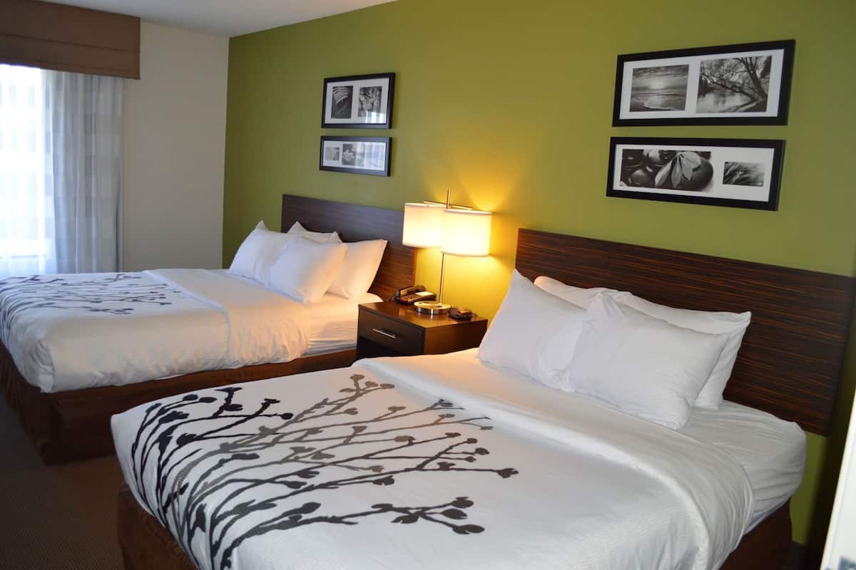 Premium bedding, desk, blackout drapes, iron/ironing board