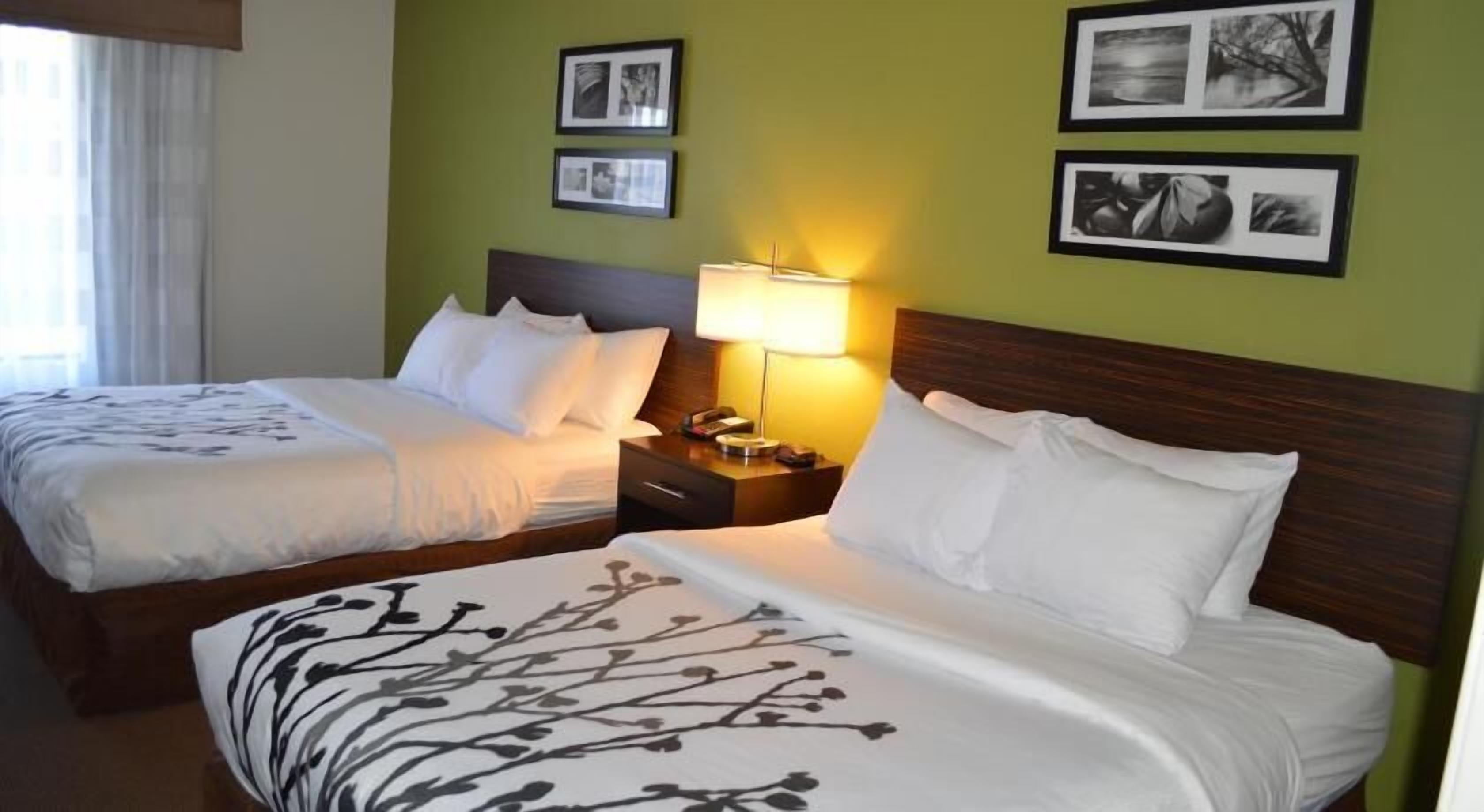 Premium bedding, desk, blackout drapes, iron/ironing board