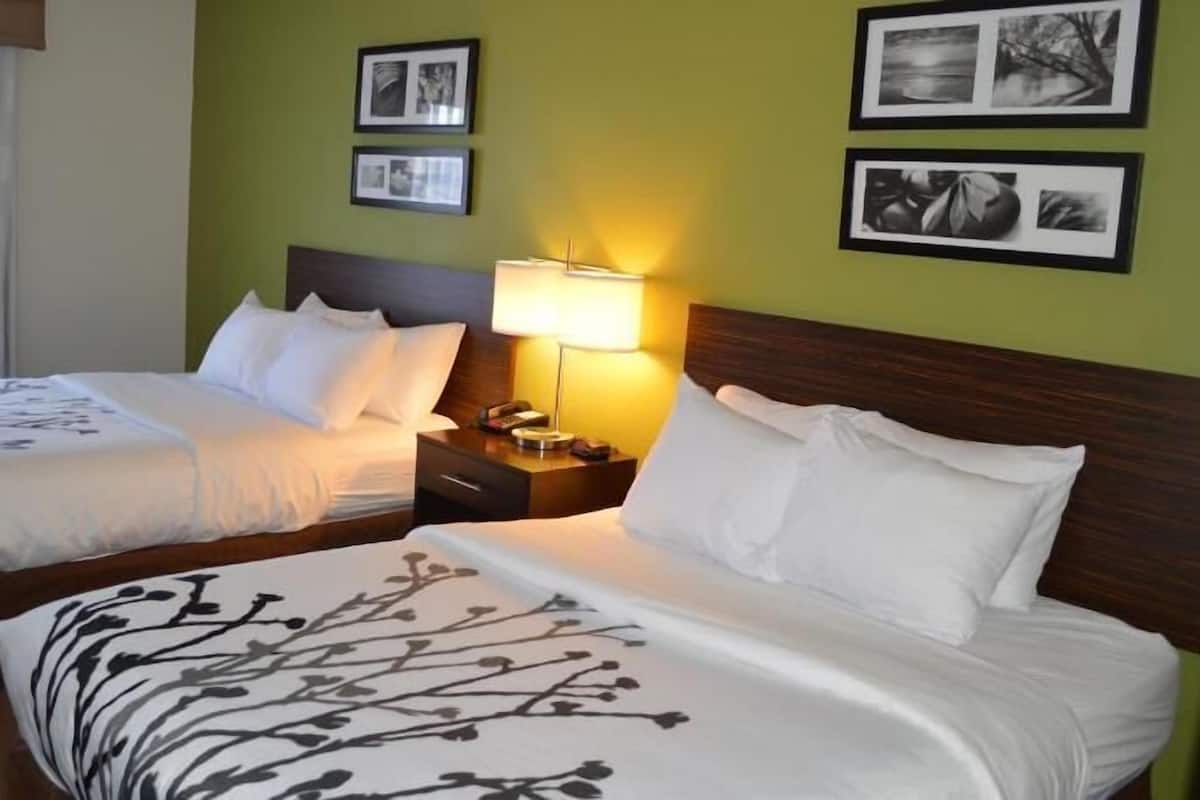 Premium bedding, desk, blackout drapes, iron/ironing board