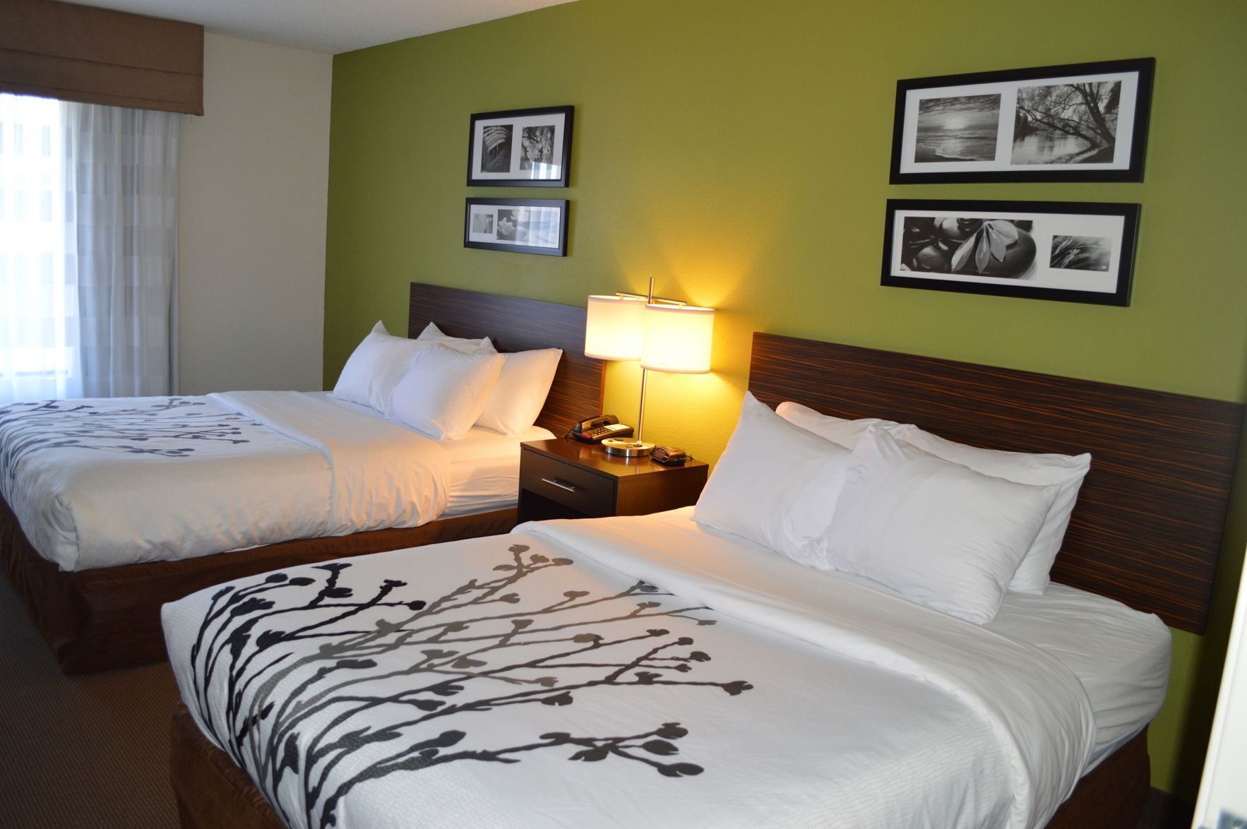 Premium bedding, desk, blackout drapes, iron/ironing board