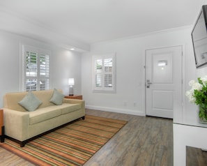 Suite, 1 King Bed with Sofa bed, Non Smoking (Cottage) | Living area