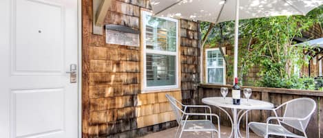 Suite, 1 King Bed with Sofa bed, Non Smoking (Cottage) | Pillowtop beds, desk, laptop workspace, iron/ironing board