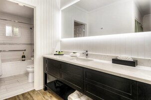 Suite, 1 King Bed with Sofa bed, Non Smoking (Cottage) | Bathroom | Designer toiletries, hair dryer, towels, soap